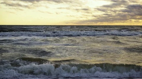 Little waves in the setting sun Stock-Footage 82320025