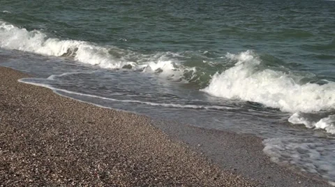 Little waves at shore Stock Footage 36675531