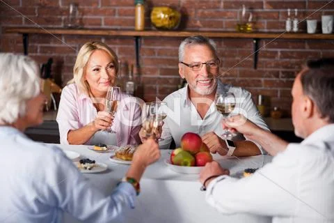 Little wine tasting for four people in the restaurant Stock Photos