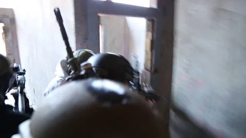 Live Action Shot of SWAT Trainees with Weapons in Building Clearing Exercise Stock Footage 70561966