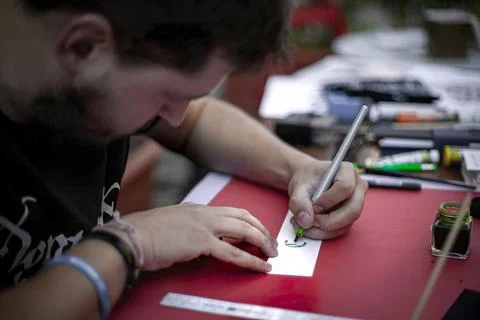 Live calligraphy tutorial in Sassari Stock Photos