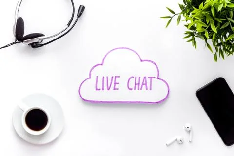 Live chat conversation message concept. Office desktop top view Stock Photos