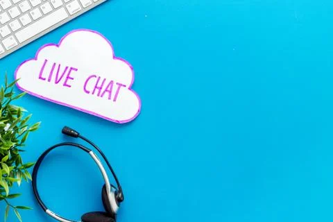 Live chat conversation message concept. Office desktop top view Stock Photos