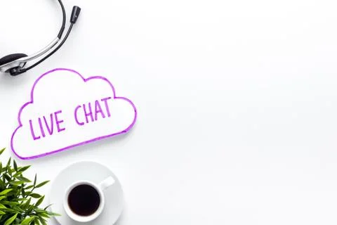 Live chat conversation message concept. Office desktop top view Stock Photos