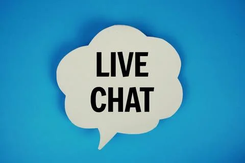 Live Chat text with speech bubble top view on blue background Foto stock