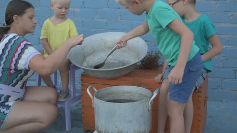 Live crayfish caught in river are cooked in arge aluminum pan in open air. Wo Stock Footage 93293118