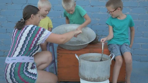Live crayfish caught in river are cooked in arge aluminum pan in open air. Wo Stock Footage 93293182