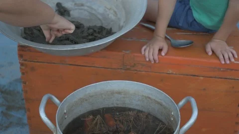 Live crayfish caught in river are cooked in arge aluminum pan in open air. Wo Stock Footage 93293226