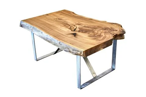 Live edge elm slab coffee table with metal base on white background Stock-Fotos