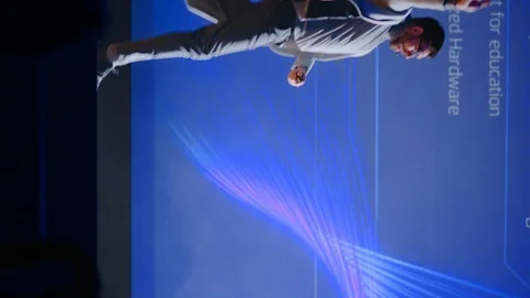 Live Event Stage: Speaker Presents New Product, Screen SHows Neural Networks Stock Footage 122815067