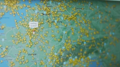 Live Flight Tracker Map on computer screen. Crowded air space. Location of Stock Footage 272625408