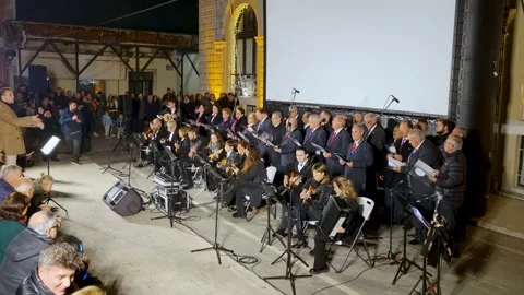 Live night performance of a traditional choir and acoustic orchestra Stock Footage 341727171