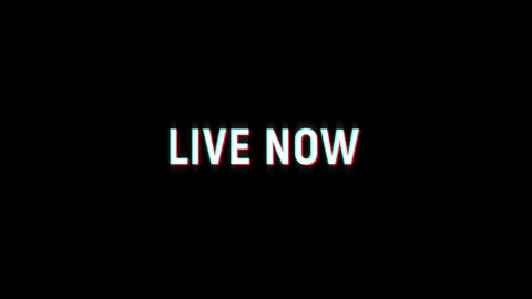 Live now text glitch animation effect streaming and broadcast video Stock Footage 313297288