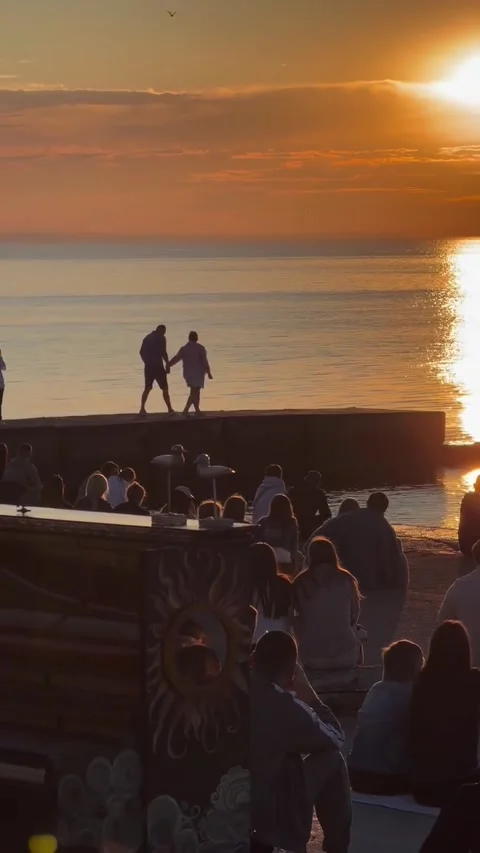 Live Piano Performance at Beachside Sunset Gathering Stock Footage 339881287