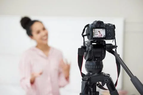 Live streaming, tutorial and influencer woman in home living room as freelance Stock Photos