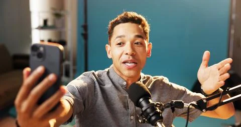 Live streaming, vlogger and man talk with microphone and digital podcast for Stock Photos