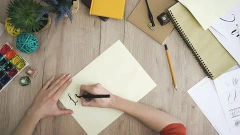 Live without regret In Calligraphy Form Drawing twirl Motivational Phrases Stock Footage 148694312