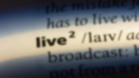 Live word in a dictionary. Stock Footage 99562763