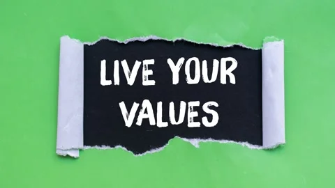 Live your values message writing on ripped torn paper background Stock Footage 321347991