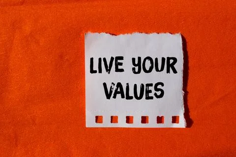 Live your values message written on ripped torn paper background. Conceptua.. 写真素材