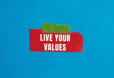 Live your values message written on ripped torn paper background. Conceptua.. 写真素材