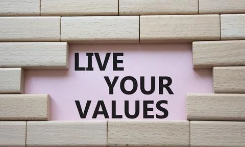 Live your values symbol. Concept words Live your values on wooden blocks. B.. Stock Photos