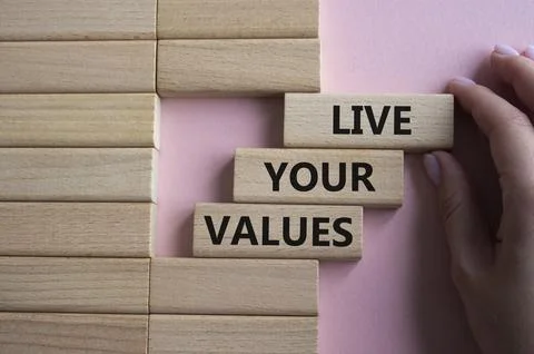 Live your values symbol. Concept words 'Live your values' on wooden blocks... Stock Photos