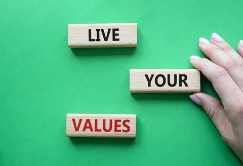 Live your values symbol. Concept words Live your values on wooden blocks. B.. Stock Photos