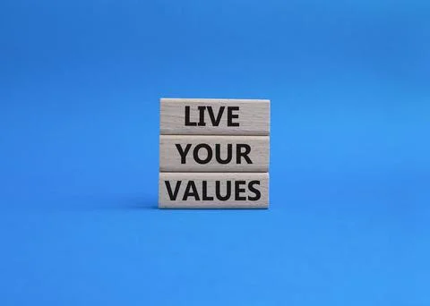 Live your values symbol. Concept words 'Live your values' on wooden blocks... Stock Photos