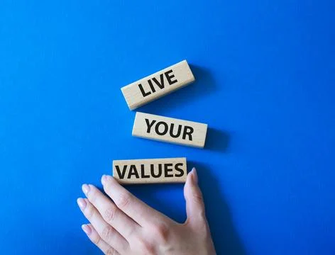 Live your values symbol. Concept words Live your values on wooden blocks. B.. Stock Photos