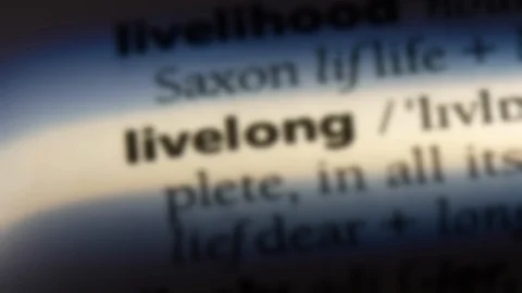 Livelong word in a dictionary. Stock Footage 99562779