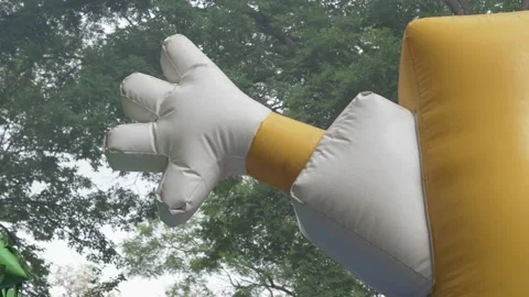 A lively inflatable character hand can be a wonderful addition to any outdoor Видео 280997365