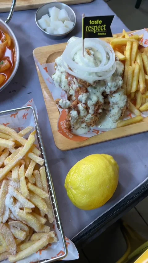 Lively presentation of diverse chicken choices with lemon and parmesan dust Stock Footage 335435161
