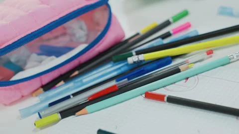 Lively student area with vivid writing utensils. An energetic array of Stock Footage 331361080