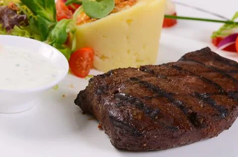 Liver with mashed potatoes and spinach Stock Photos