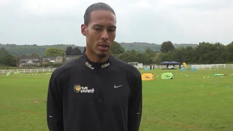 Liverpool captain Virgil van Dijk visits a McDonald's Fun Football session Stock Footage 283175840