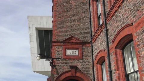 Liverpool dock Pilot Office red brick pan up Stock Footage 74468988
