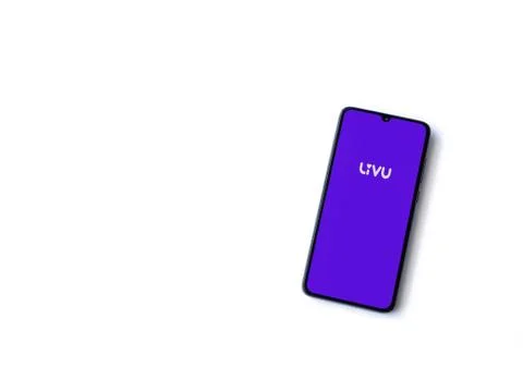 LiveU app launch screen with logo on the display of a black mobile smartphone Stock Photos