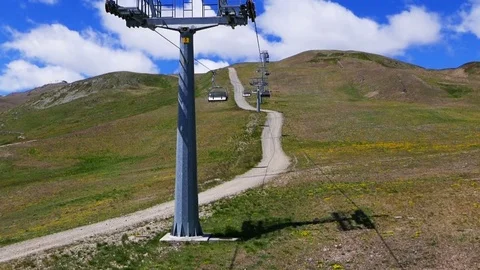 Livigno, Italy. Chairlift Mountain View Stock Footage