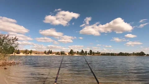 Living clouds over the lake. Stock Footage 141134489