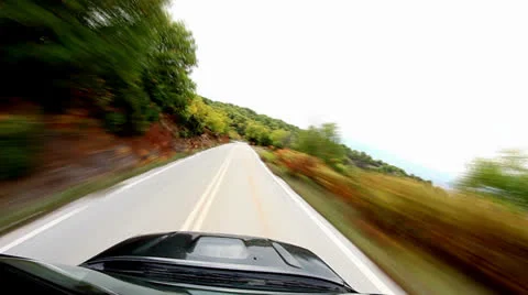 Living on the edge...  Accelerated video of driving a car Stock Footage 24587062