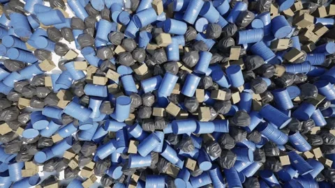 A living garbage dump. Trash made of plastic, metal and cardboard moves in a Stock-Footage 270197346