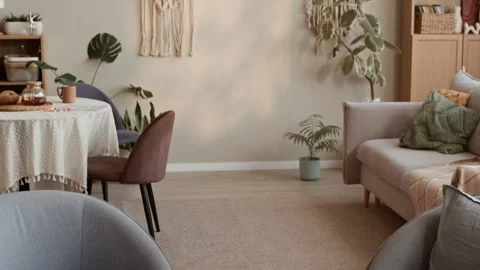 Living Room Interior with Chessboard on Table, Armchairs, Sofa and Boho Decor Stock Footage 333186020