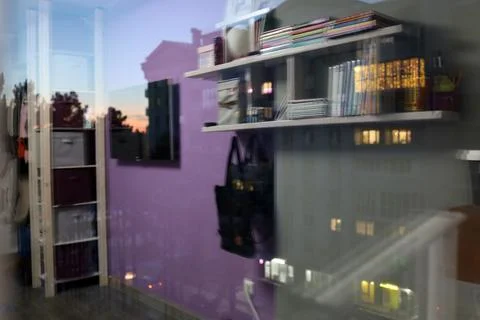 The living room is reflected in the window, double exposure Stock Photos