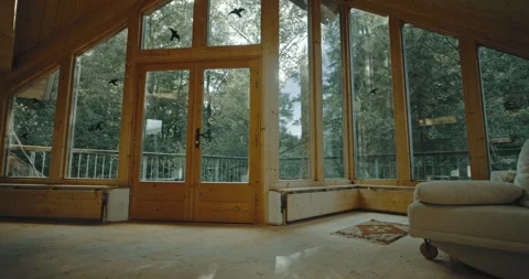 Living room surrounded by windows Stock Footage 254912120