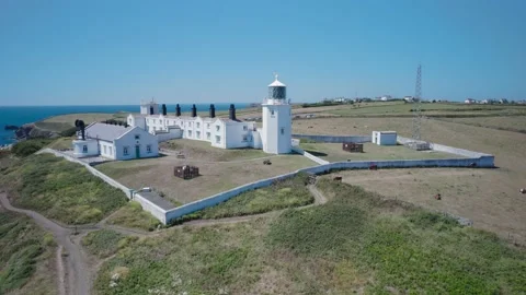 Lizard Lighthouse and Housel Bay Cliffs from a drone, Lizard, Helston, Cornwall Stock Footage 201171961