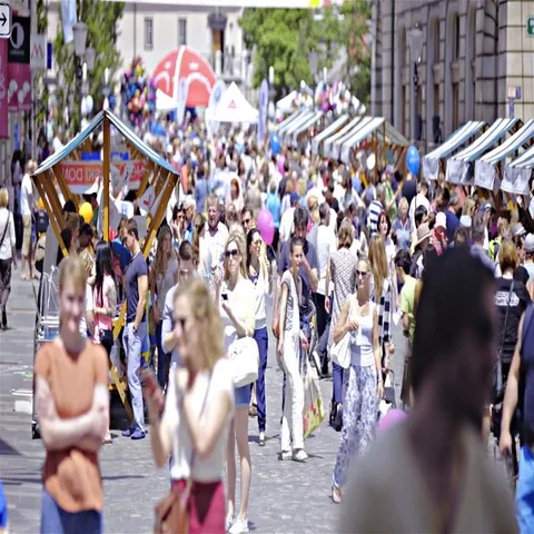 Ljubljana city center commuters and tourists walking through timelapse 4K Stock Footage