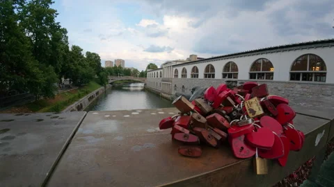 The Ljubljanica River flows past The Central Market building Stock Footage 346160983