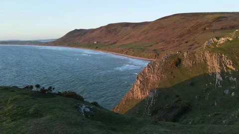 Llangennith beach is situated on the western edge of the Gower Peninsula DRONE Stock Footage 241483742