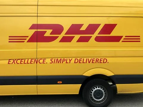 LLgo on a yellow DHL van. Stock Photos